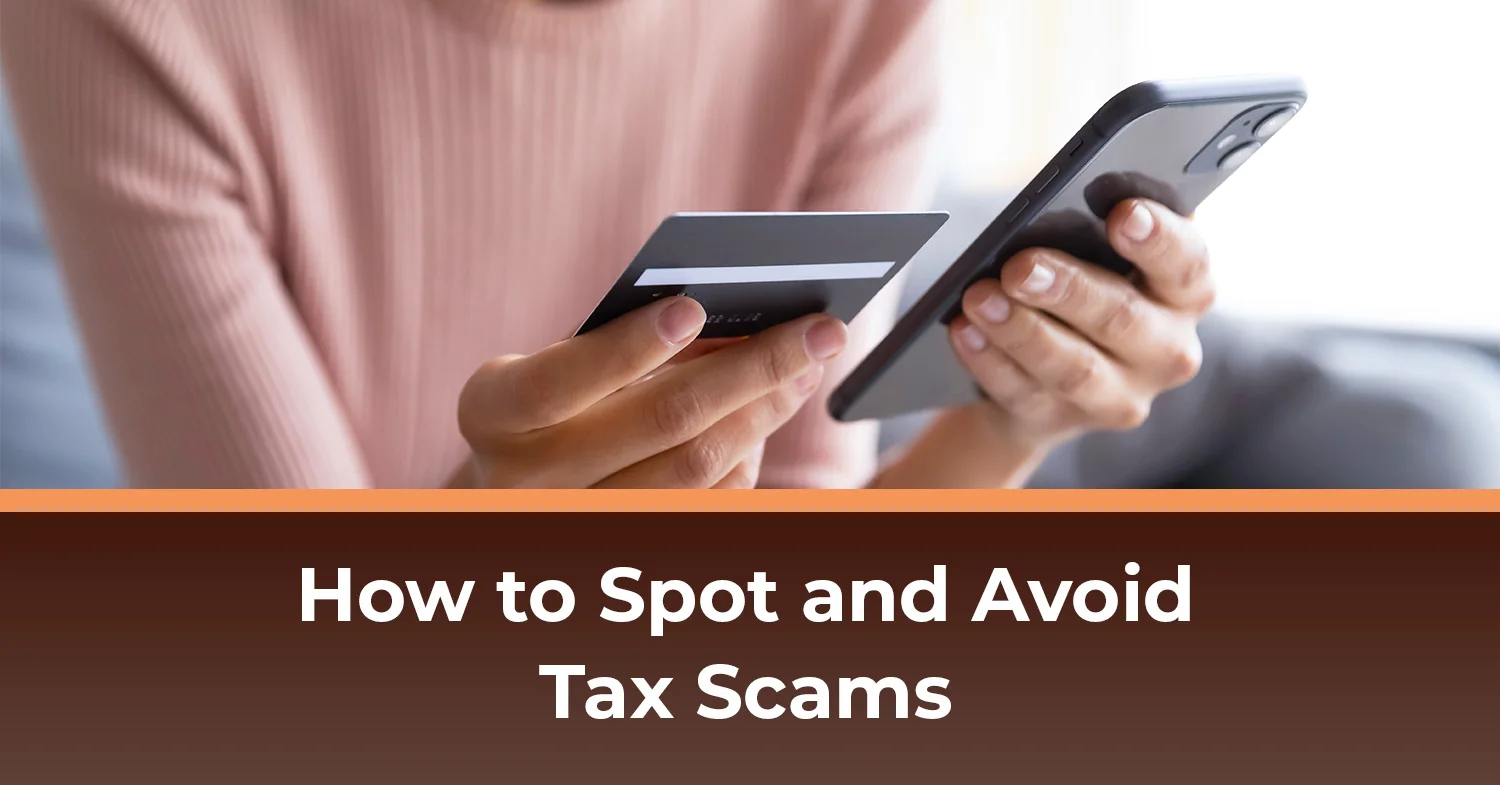 A person reading their credit card number to a scammer on the phone - an example of one of the many tax scams out there.